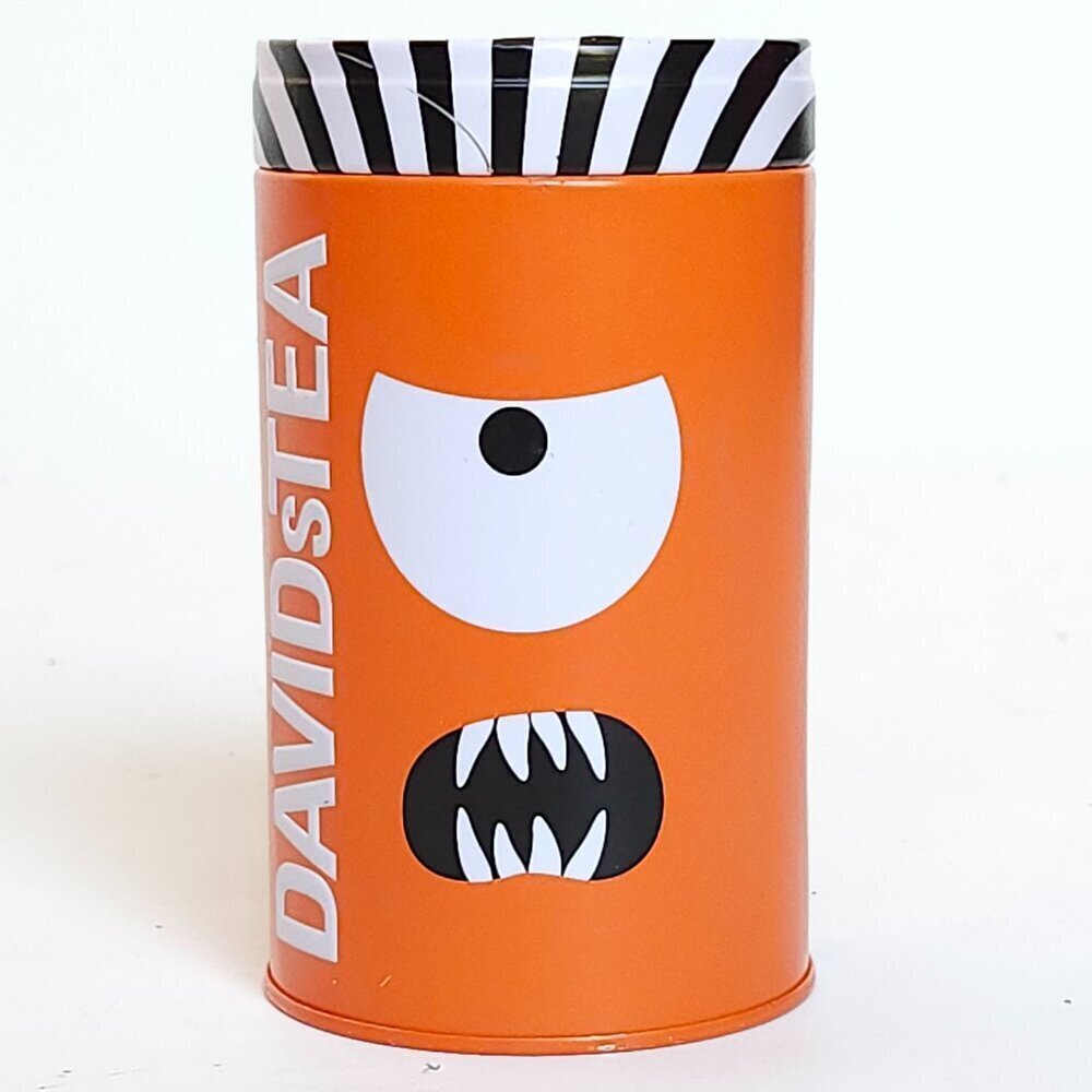 DAVIDS TEA HALLOWEEN TIN MONSTER CYCLOPS One Eyed Monster BRIGHT Orange Black